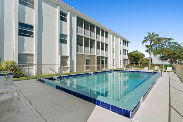 236 Castlewood Dr Unit 301, North Palm Beach, FL 33408 - community pool featuring fence