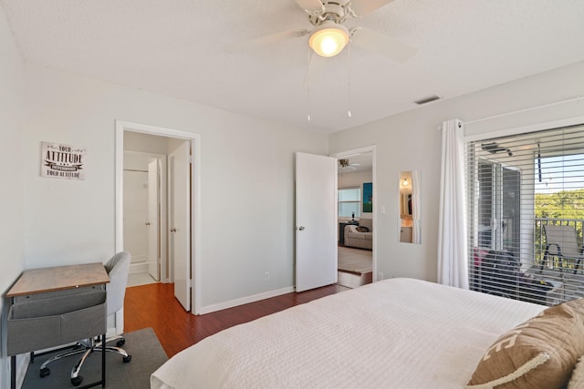 236 Castlewood Dr Unit 301, North Palm Beach, FL 33408 - bedroom with wood finished floors, ceiling fan, visible vents, and baseboards