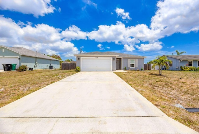ranch-style home with a front lawn, an attached garage, driveway, stucco siding, and fence