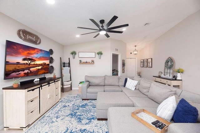 living room with recessed lighting, vaulted ceiling, baseboards, visible vents, and a ceiling fan