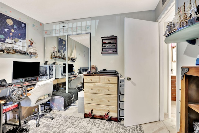 home office with marble finish floor
