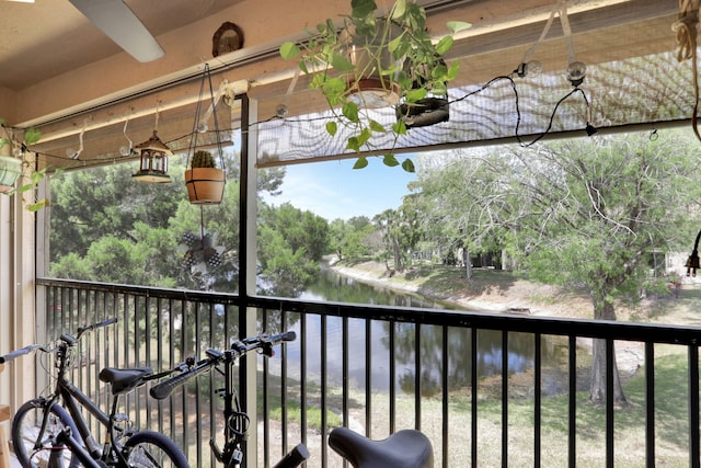 balcony featuring a water view