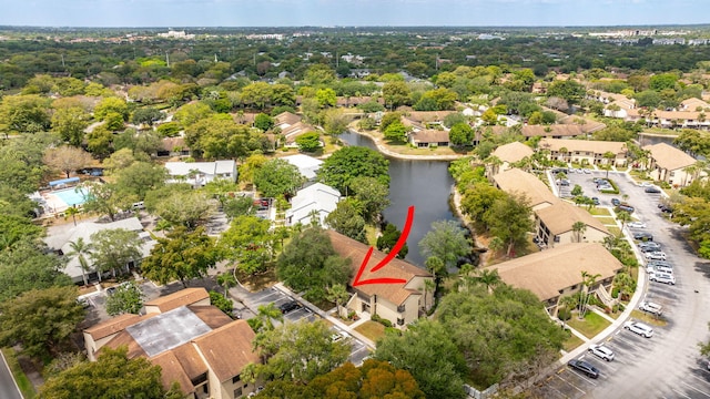 bird's eye view with a residential view and a water view