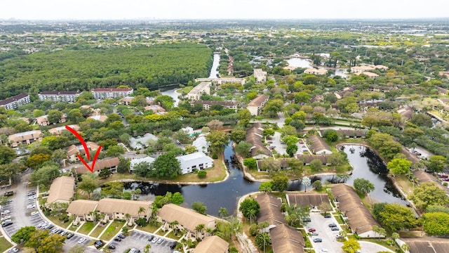 drone / aerial view with a water view