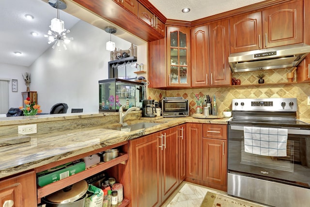 kitchen featuring light stone countertops, a sink, under cabinet range hood, stainless steel electric range oven, and a toaster