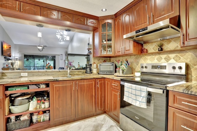 kitchen with stainless steel range with electric cooktop, a toaster, under cabinet range hood, backsplash, and a sink