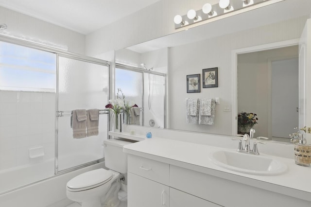 1054 NW Tuscany Dr, Port Saint Lucie, FL 34986 - bathroom featuring bath / shower combo with glass door, vanity, and toilet
