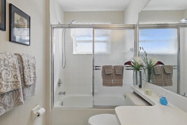 1054 NW Tuscany Dr, Port Saint Lucie, FL 34986 - bathroom featuring toilet and combined bath / shower with glass door