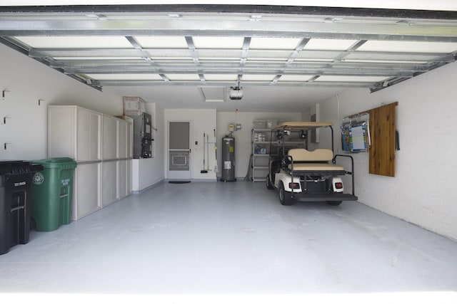 1054 NW Tuscany Dr, Port Saint Lucie, FL 34986 - garage with a garage door opener, heating unit, and water heater