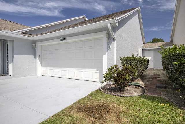 1054 NW Tuscany Dr, Port Saint Lucie, FL 34986 - garage featuring concrete driveway