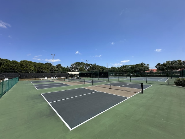 1054 NW Tuscany Dr, Port Saint Lucie, FL 34986 - view of sport court with fence and community basketball court