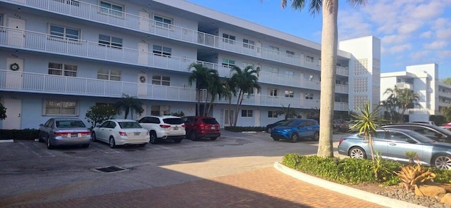 2006 S Federal Hwy S Unit 102, Boynton Beach, FL 33435 - view of building exterior featuring uncovered parking