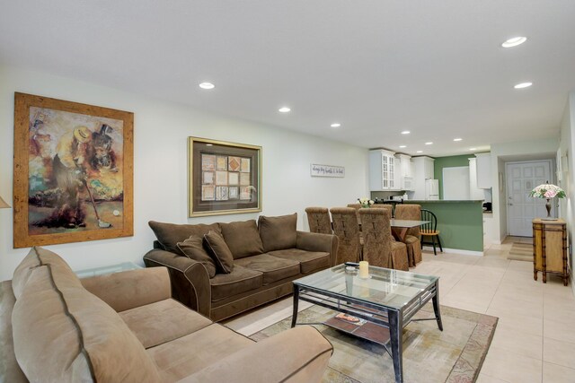 bedroom featuring ceiling fan, visible vents, and ensuite bath