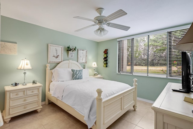 4801 Esedra Ct Unit 104, Lake Worth, FL 33467 - bedroom with a ceiling fan, baseboards, and light tile patterned floors