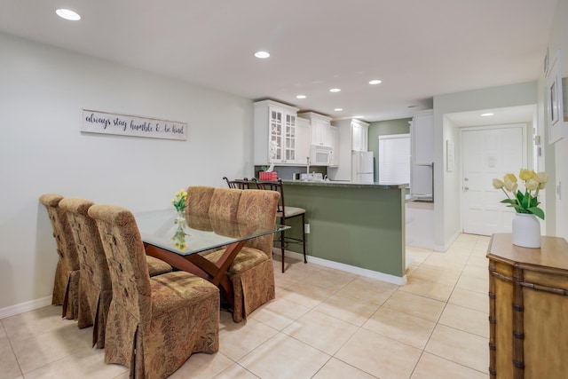 4801 Esedra Ct Unit 104, Lake Worth, FL 33467 - dining room featuring recessed lighting, baseboards, and light tile patterned floors