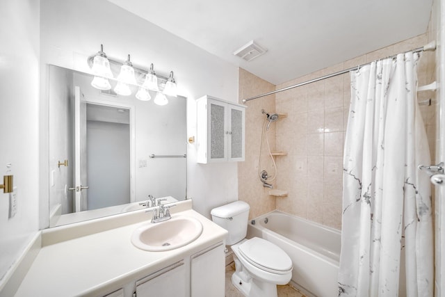 bathroom with visible vents, toilet, vanity, and shower / tub combo with curtain