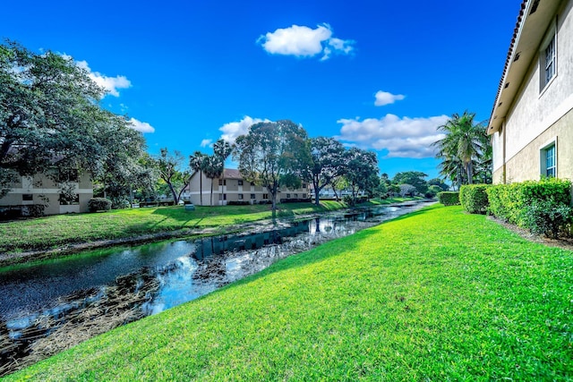 view of yard featuring a water view
