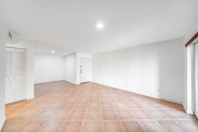 below grade area with recessed lighting and baseboards