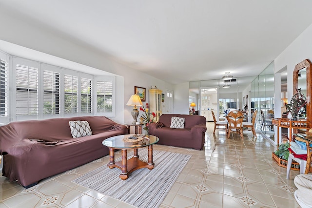 living room featuring light tile patterned flooring