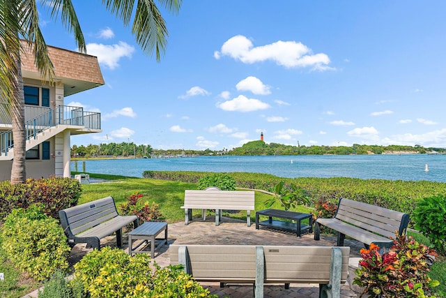 view of community with a water view