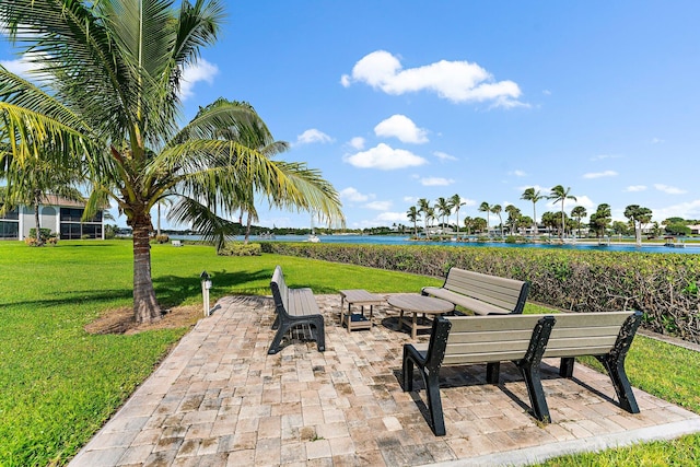 view of patio featuring a water view