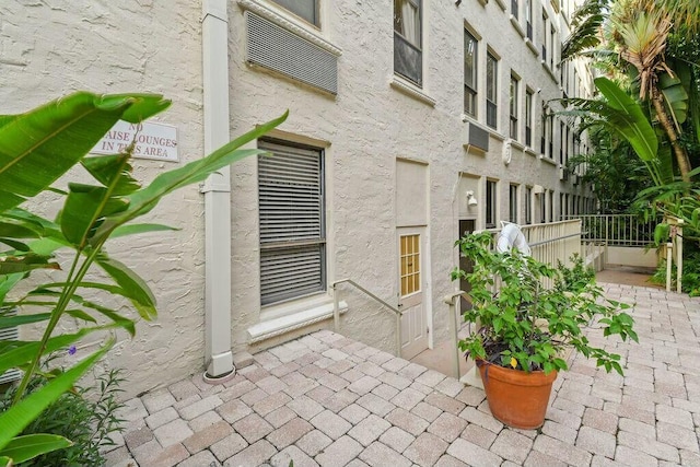 235 Sunrise Ave Unit 1051, Palm Beach, FL 33480 - exterior space with stucco siding