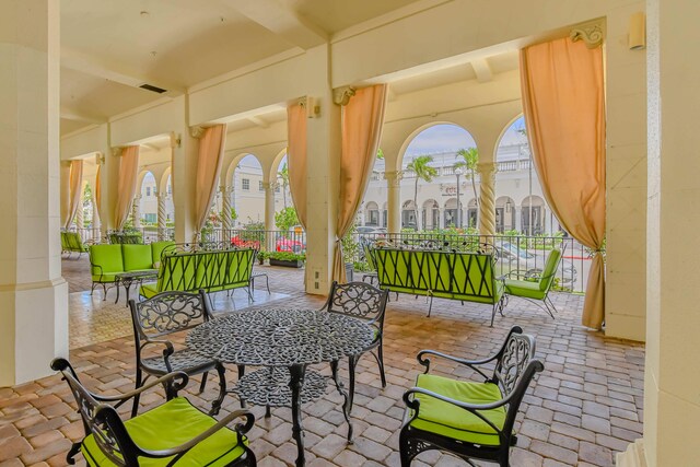 235 Sunrise Ave Unit 1051, Palm Beach, FL 33480 - sunroom / solarium featuring visible vents and a healthy amount of sunlight