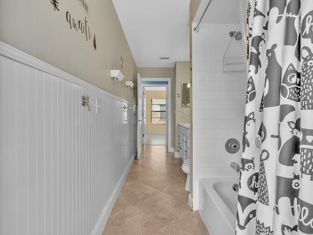 corridor with light tile patterned flooring