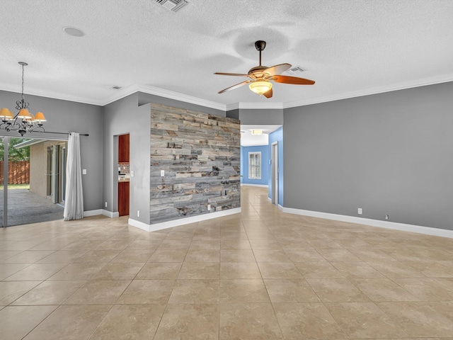 empty room featuring light tile patterned flooring, a textured ceiling, ceiling fan with notable chandelier, baseboards, and ornamental molding