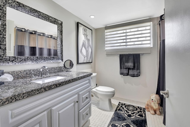 15108 Ashland Dr Unit 185, Delray Beach, FL 33484 - full bathroom with curtained shower, toilet, tile patterned flooring, and vanity