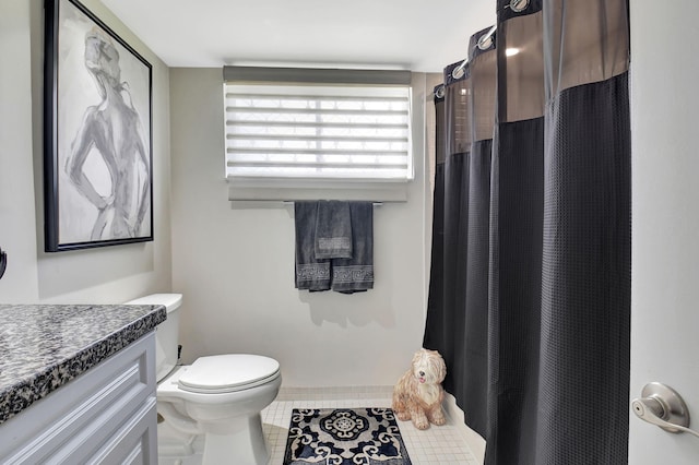 15108 Ashland Dr Unit 185, Delray Beach, FL 33484 - bathroom with tile patterned floors, a shower with shower curtain, toilet, and vanity