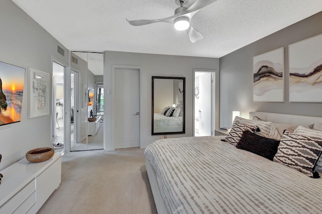 15108 Ashland Dr Unit 185, Delray Beach, FL 33484 - bedroom with visible vents, a ceiling fan, and light carpet