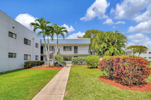 15108 Ashland Dr Unit 185, Delray Beach, FL 33484 - exterior space with a lawn and stairs