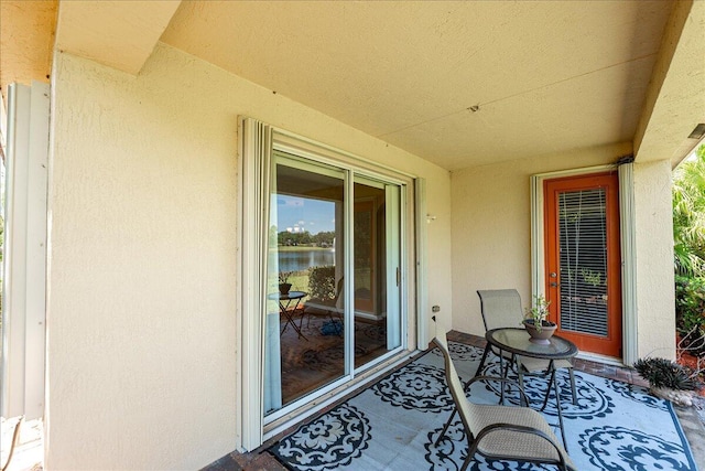 9925 SW Stonegate Dr, Port Saint Lucie, FL 34987 - view of patio with a water view