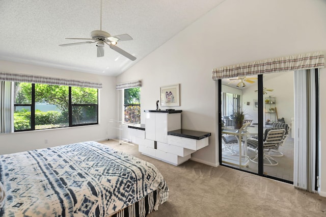 14 Windsor Ln, Boynton Beach, FL 33436 - bedroom with access to outside, light colored carpet, a textured ceiling, baseboards, and high vaulted ceiling