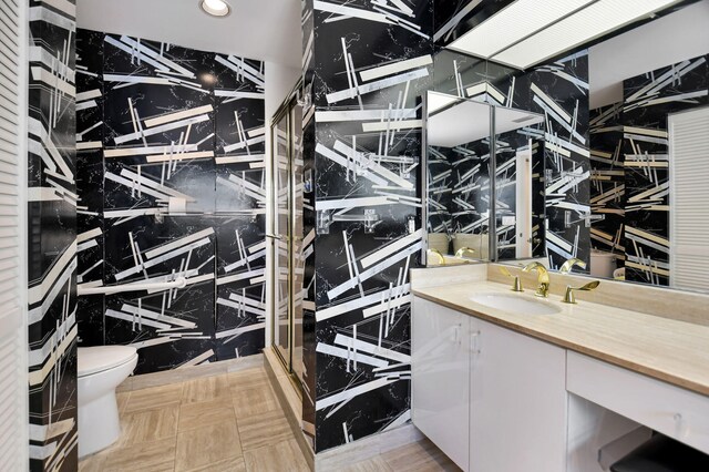 14 Windsor Ln, Boynton Beach, FL 33436 - bathroom with toilet, vanity, recessed lighting, and a stall shower