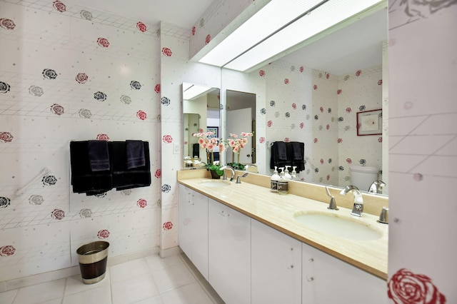 14 Windsor Ln, Boynton Beach, FL 33436 - bathroom featuring toilet, double vanity, and tile patterned floors