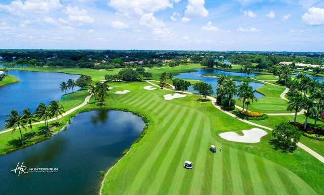 14 Windsor Ln, Boynton Beach, FL 33436 - aerial view of a nearby body of water, a golf course, and a tree filled landscape