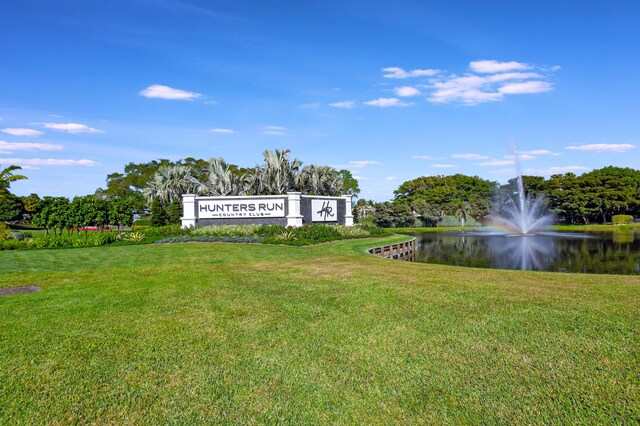 14 Windsor Ln, Boynton Beach, FL 33436 - view of grassy yard with a water view