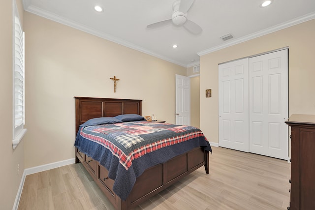 1055 Ember Ridge Run, Loxahatchee, FL 33470 - bedroom with baseboards, light wood-style flooring, recessed lighting, a closet, and crown molding