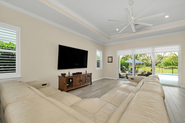 1055 Ember Ridge Run, Loxahatchee, FL 33470 - living room with light wood-type flooring, ceiling fan, baseboards, ornamental molding, and recessed lighting