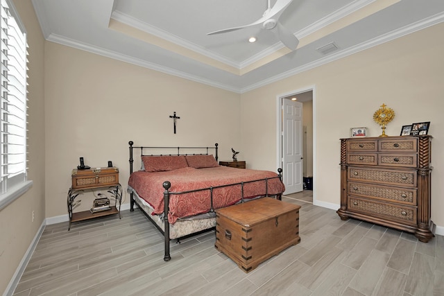 1055 Ember Ridge Run, Loxahatchee, FL 33470 - bedroom featuring a raised ceiling, baseboards, ornamental molding, light wood-type flooring, and recessed lighting