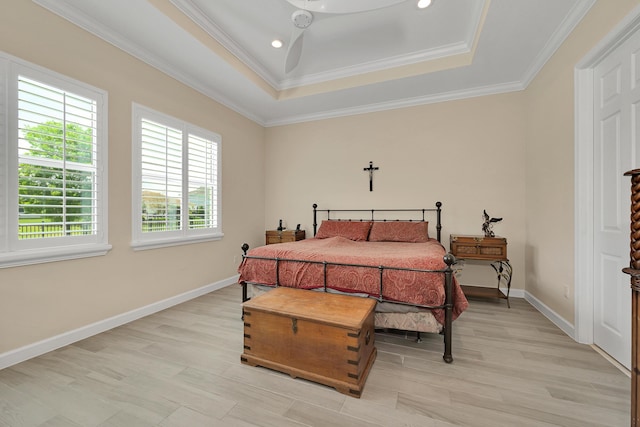 1055 Ember Ridge Run, Loxahatchee, FL 33470 - bedroom with a raised ceiling, baseboards, ornamental molding, light wood-type flooring, and recessed lighting