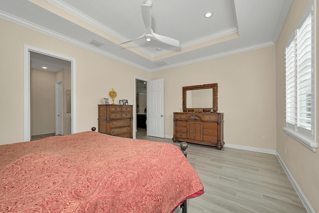 1055 Ember Ridge Run, Loxahatchee, FL 33470 - bedroom featuring light wood finished floors, baseboards, ornamental molding, a raised ceiling, and ceiling fan