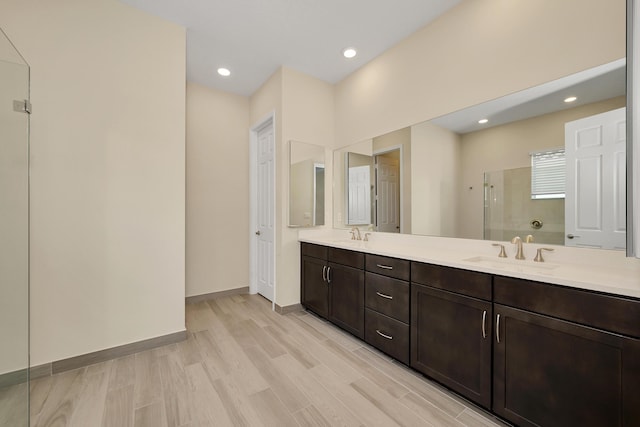 1055 Ember Ridge Run, Loxahatchee, FL 33470 - full bathroom featuring ensuite bath, wood finished floors, tiled shower, crown molding, and vanity