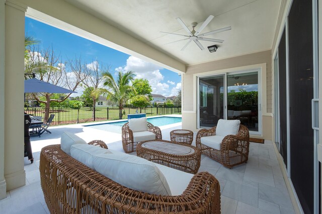 1055 Ember Ridge Run, Loxahatchee, FL 33470 - view of patio with ceiling fan, area for grilling, fence, outdoor lounge area, and outdoor dining space