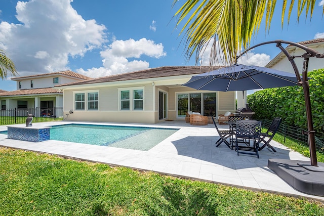 1055 Ember Ridge Run, Loxahatchee, FL 33470 - view of swimming pool with fence and a patio area