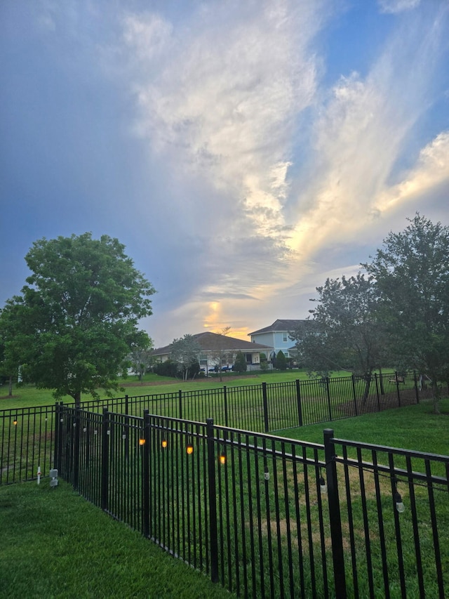 1055 Ember Ridge Run, Loxahatchee, FL 33470 - view of yard at dusk