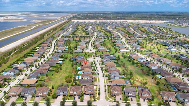 1055 Ember Ridge Run, Loxahatchee, FL 33470 - aerial overview of property's location with a nearby body of water and nearby suburban area