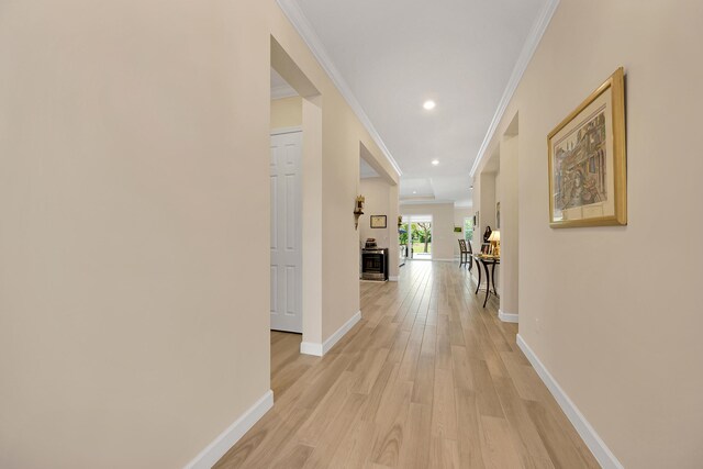 1055 Ember Ridge Run, Loxahatchee, FL 33470 - hall featuring light wood finished floors, baseboards, crown molding, and recessed lighting